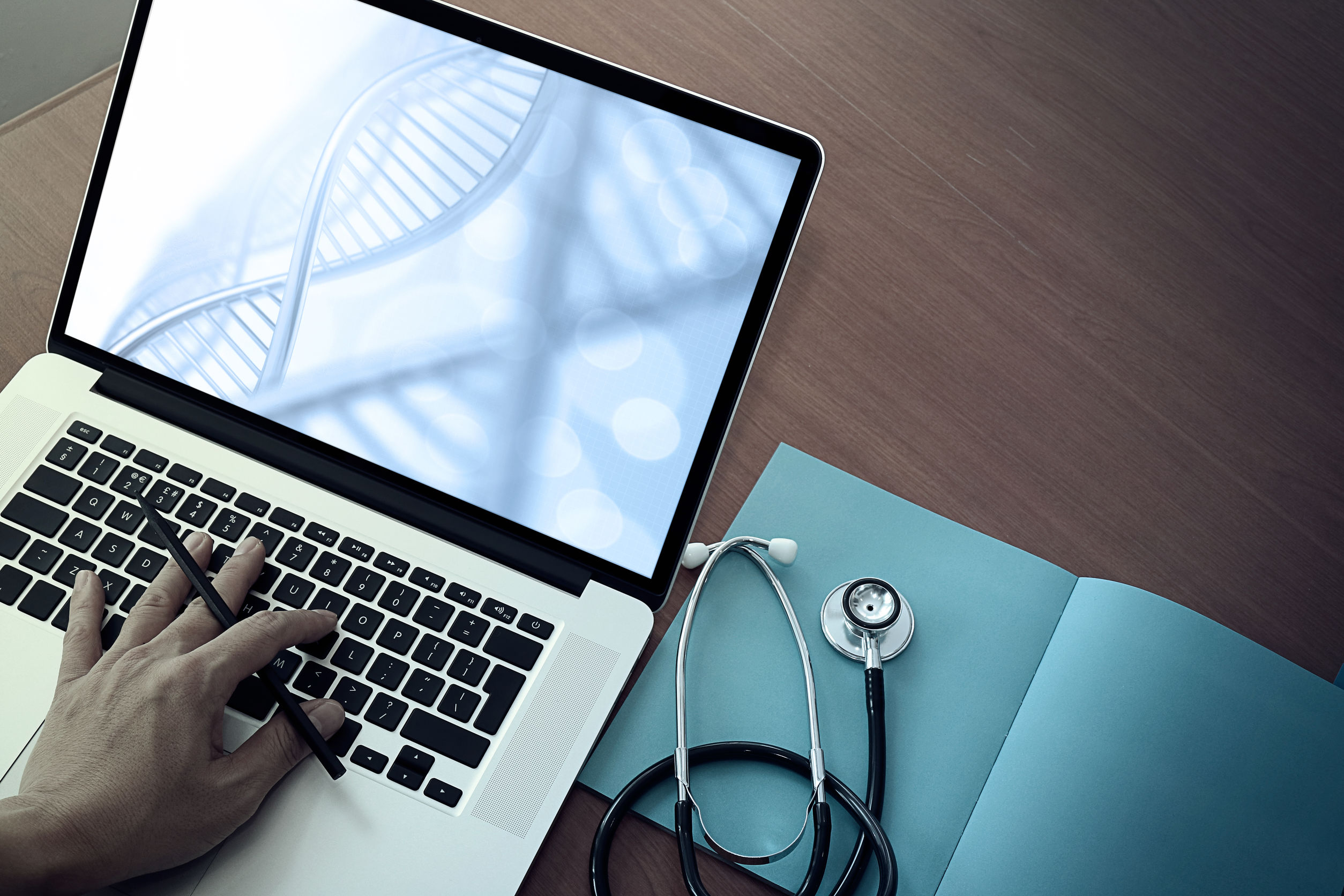 top view of Medicine doctor hand working with modern computer an